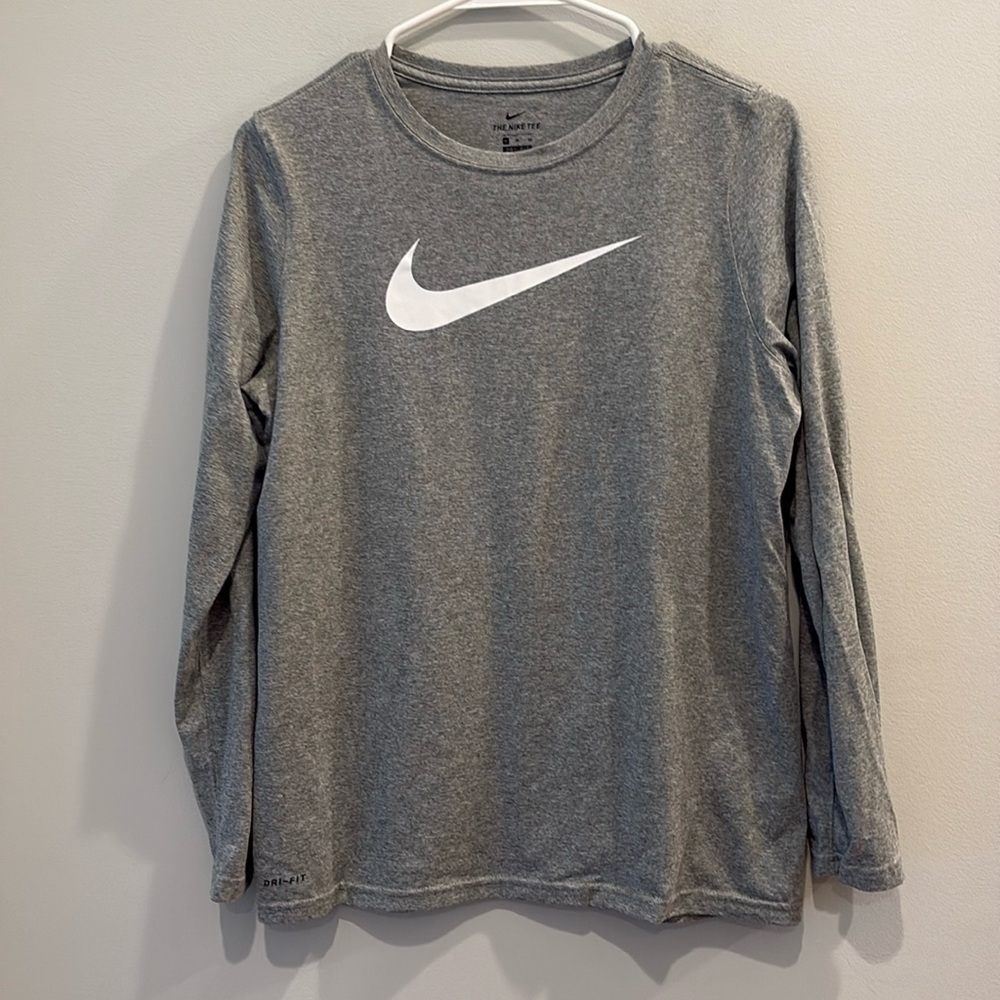 Nike - men’s long sleeve athletic dri fit shirt.  Swoosh logo. Gray. Size medium